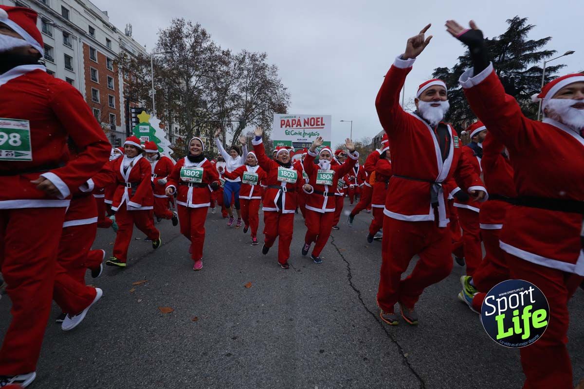 El ambiente de la Carrera de Papá Noel en Madrid