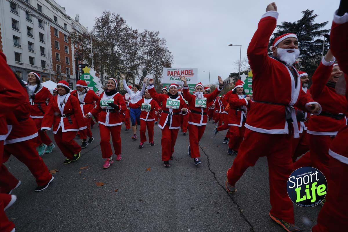 El ambiente de la Carrera de Papá Noel en Madrid