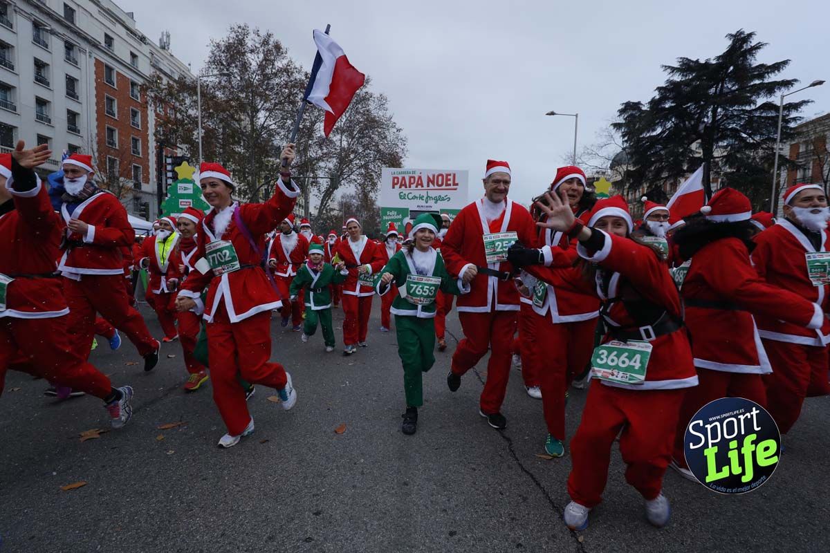 El ambiente de la Carrera de Papá Noel en Madrid