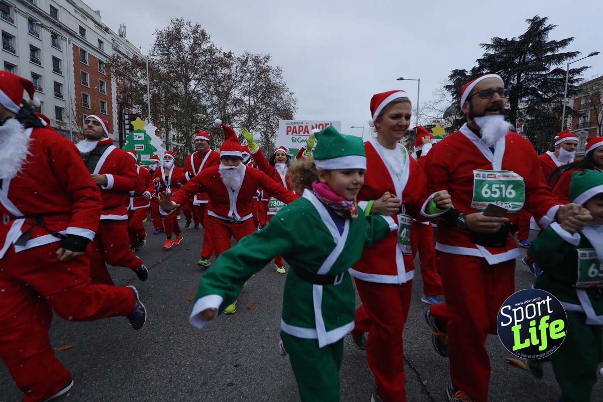 El ambiente de la Carrera de Papá Noel en Madrid
