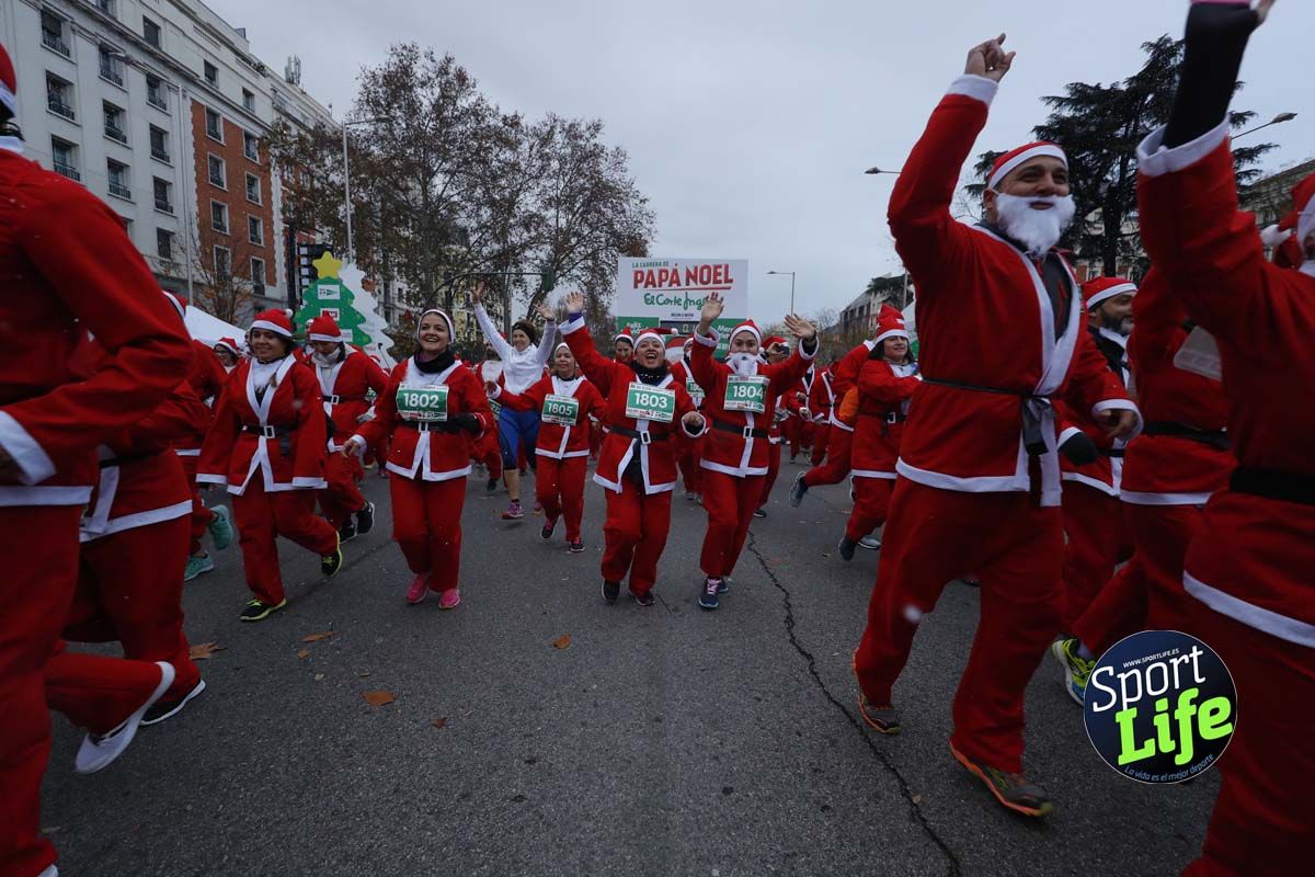 El ambiente de la Carrera de Papá Noel en Madrid