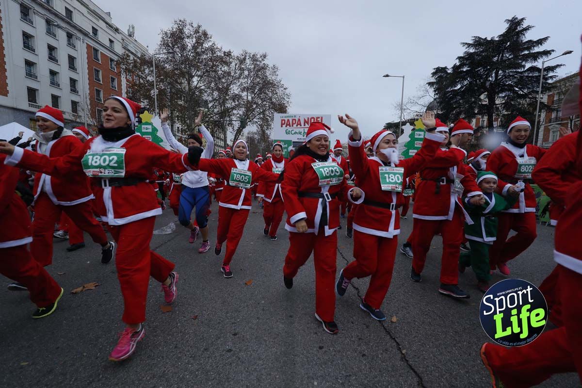 El ambiente de la Carrera de Papá Noel en Madrid