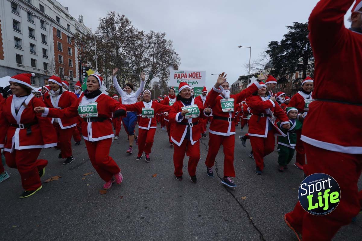 El ambiente de la Carrera de Papá Noel en Madrid