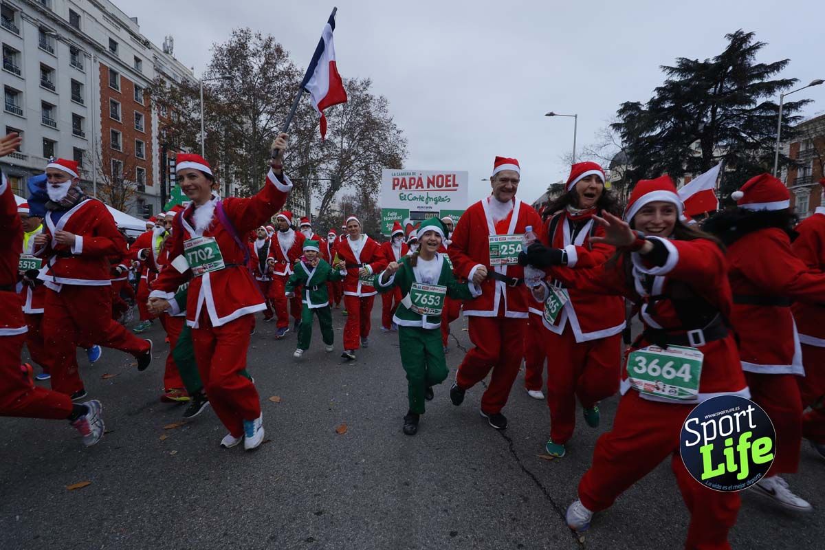 El ambiente de la Carrera de Papá Noel en Madrid