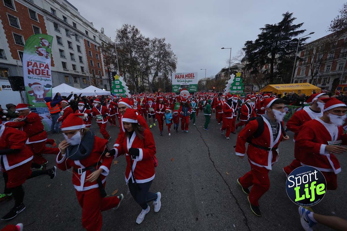 El ambiente de la Carrera de Papá Noel en Madrid