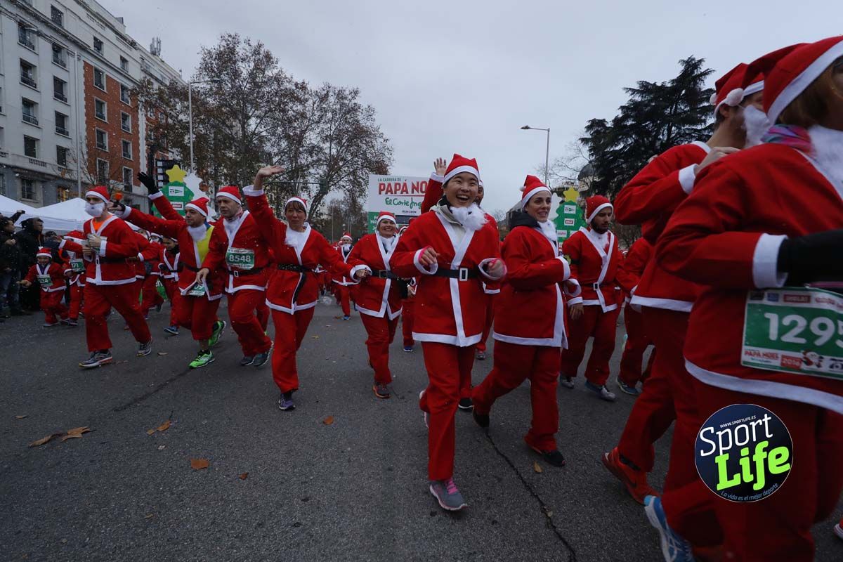 El ambiente de la Carrera de Papá Noel en Madrid