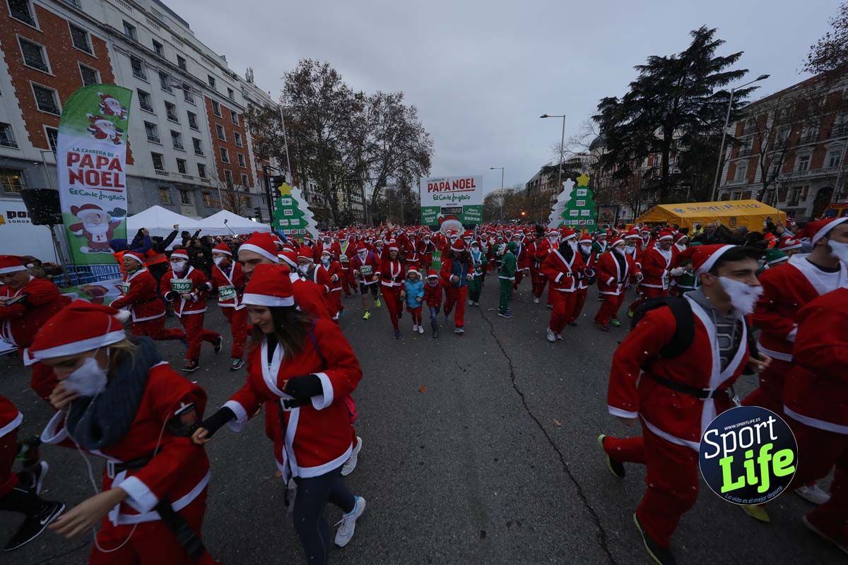 El ambiente de la Carrera de Papá Noel en Madrid