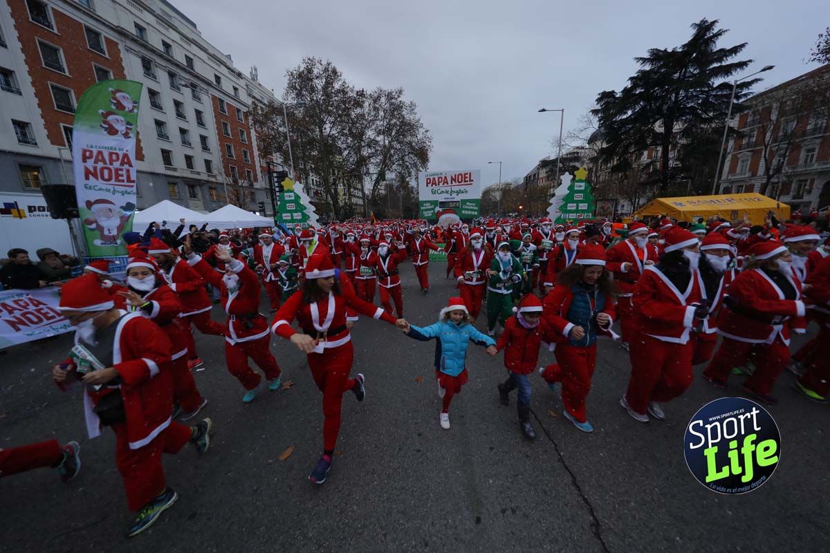 El ambiente de la Carrera de Papá Noel en Madrid