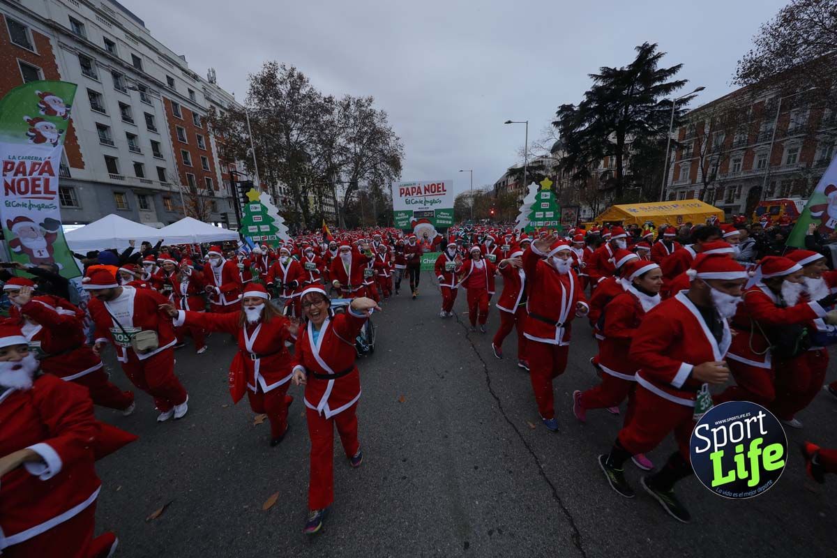 El ambiente de la Carrera de Papá Noel en Madrid