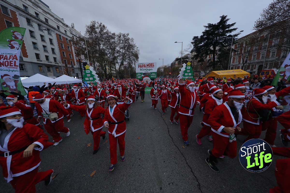 El ambiente de la Carrera de Papá Noel en Madrid