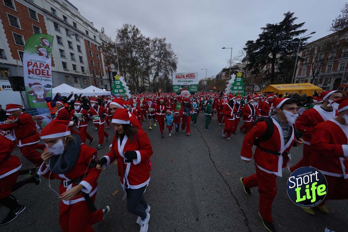 El ambiente de la Carrera de Papá Noel en Madrid
