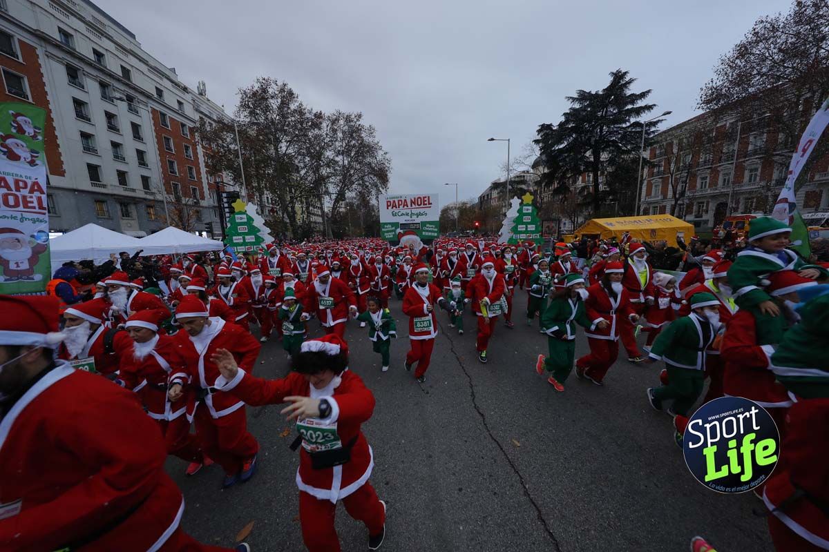 El ambiente de la Carrera de Papá Noel en Madrid