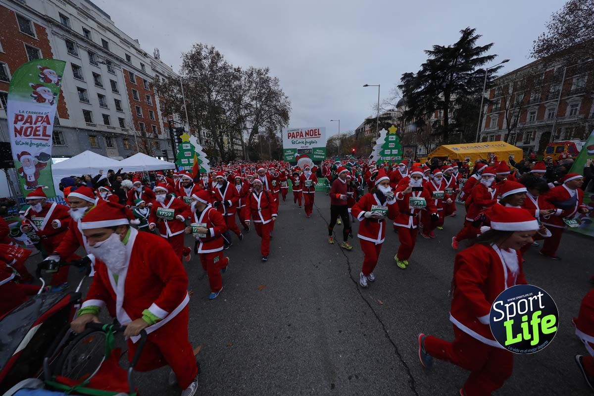 El ambiente de la Carrera de Papá Noel en Madrid