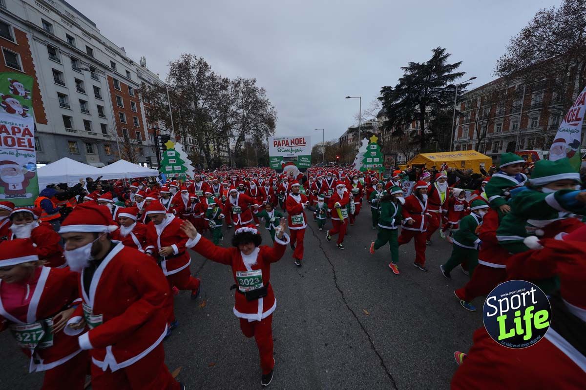 El ambiente de la Carrera de Papá Noel en Madrid