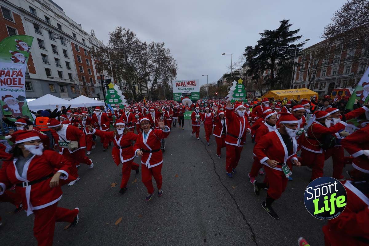 El ambiente de la Carrera de Papá Noel en Madrid