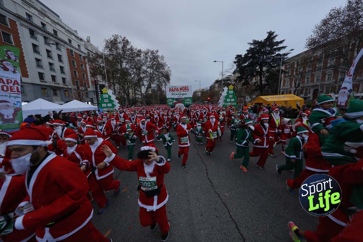El ambiente de la Carrera de Papá Noel en Madrid