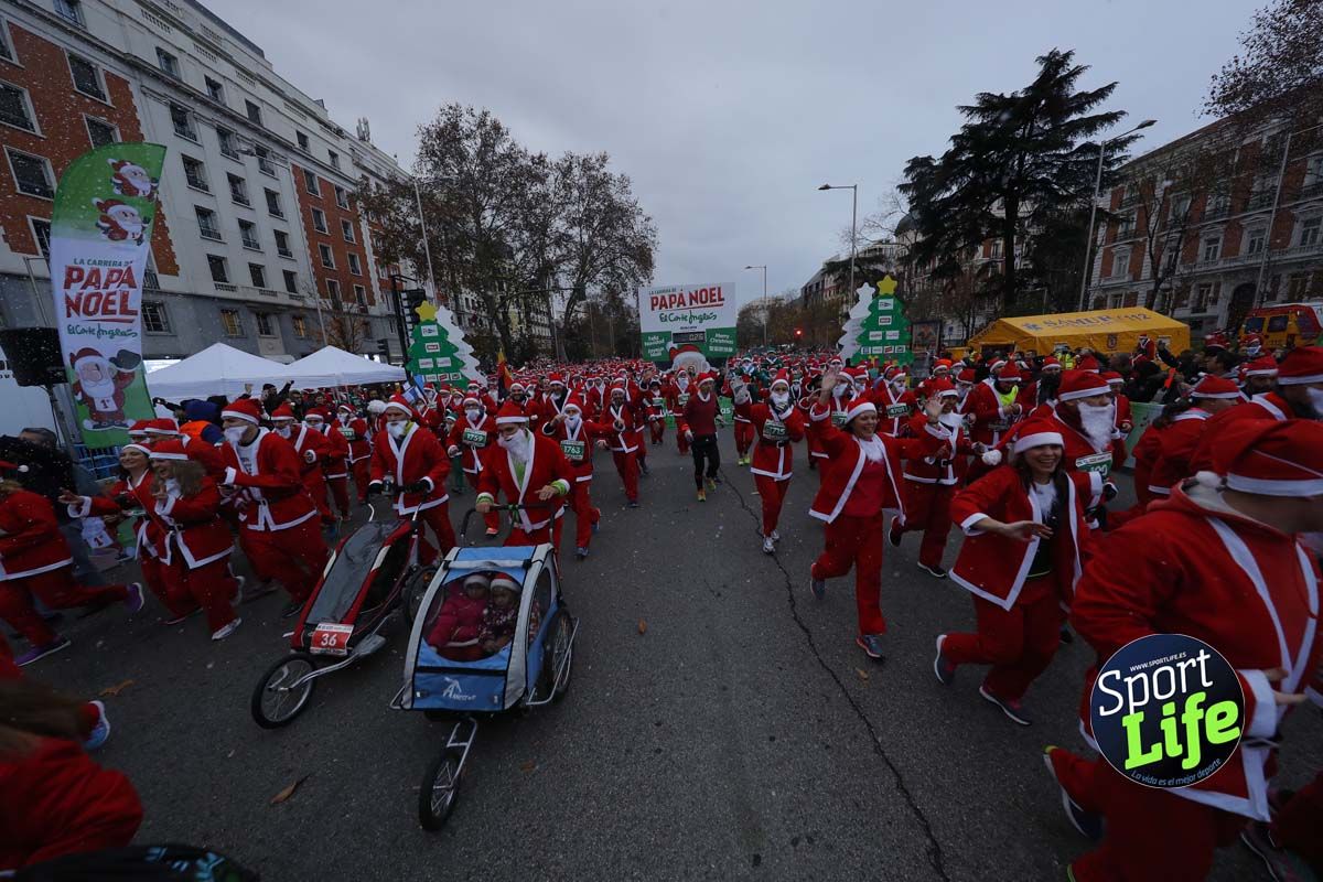 El ambiente de la Carrera de Papá Noel en Madrid