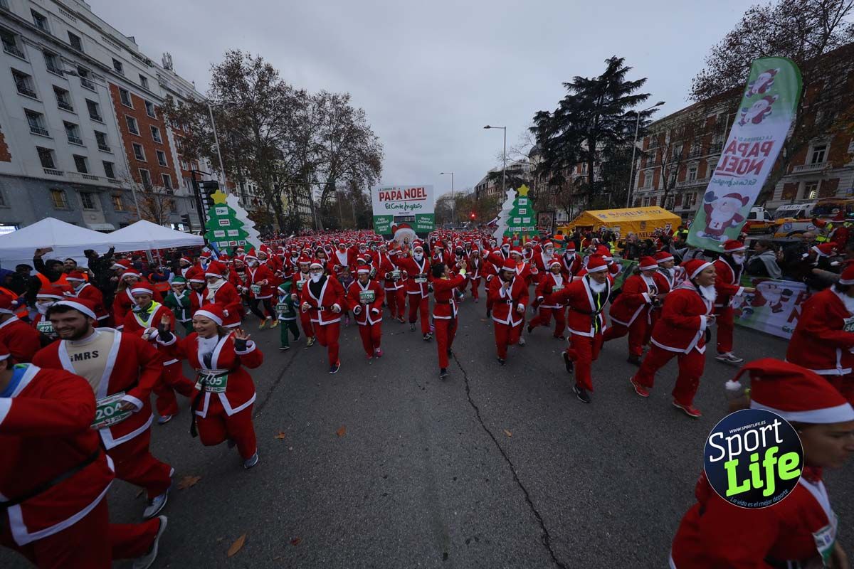 El ambiente de la Carrera de Papá Noel en Madrid
