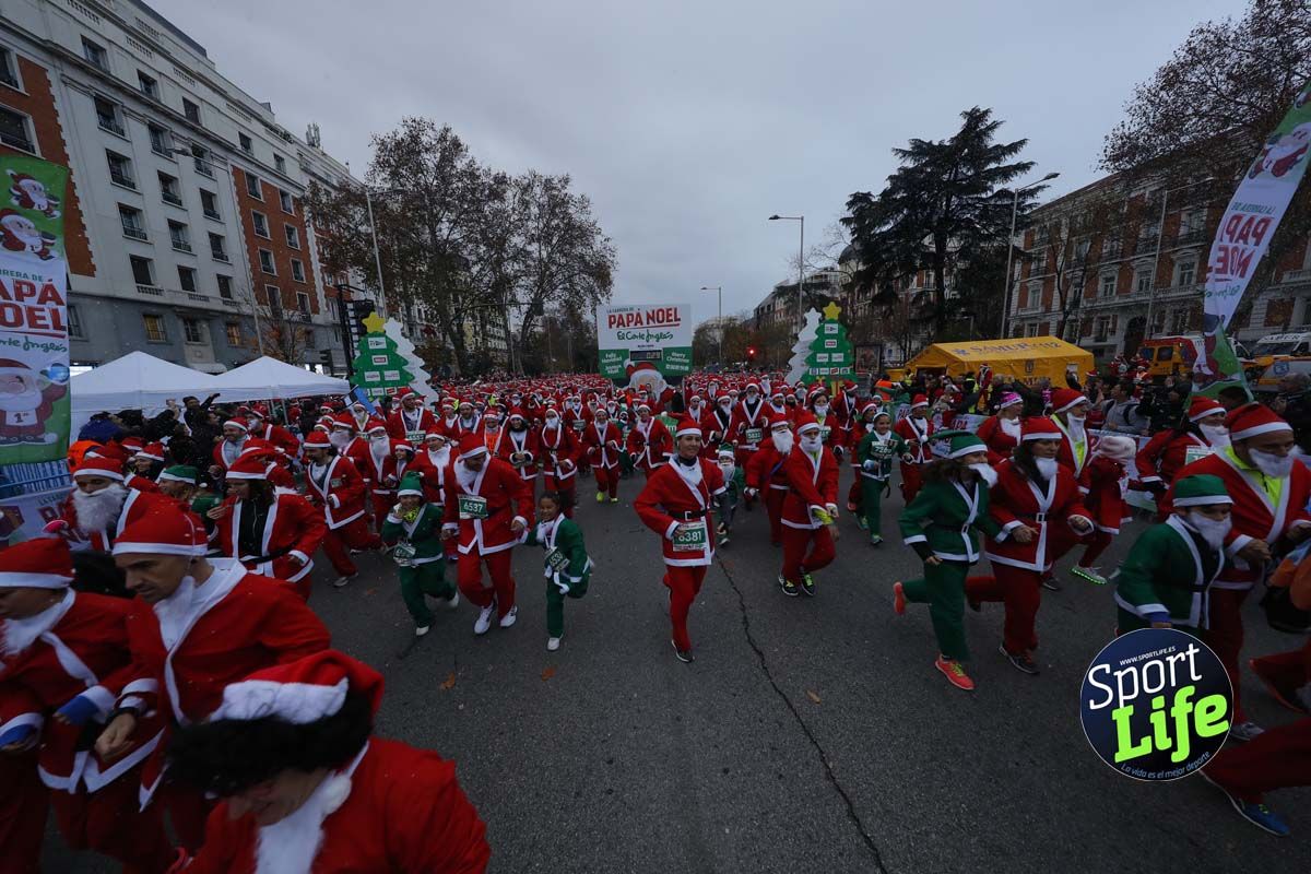 El ambiente de la Carrera de Papá Noel en Madrid