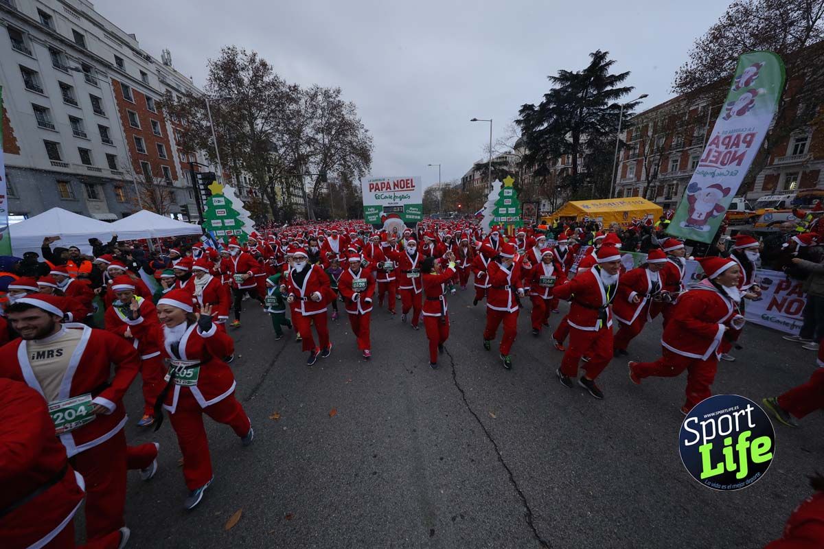 El ambiente de la Carrera de Papá Noel en Madrid