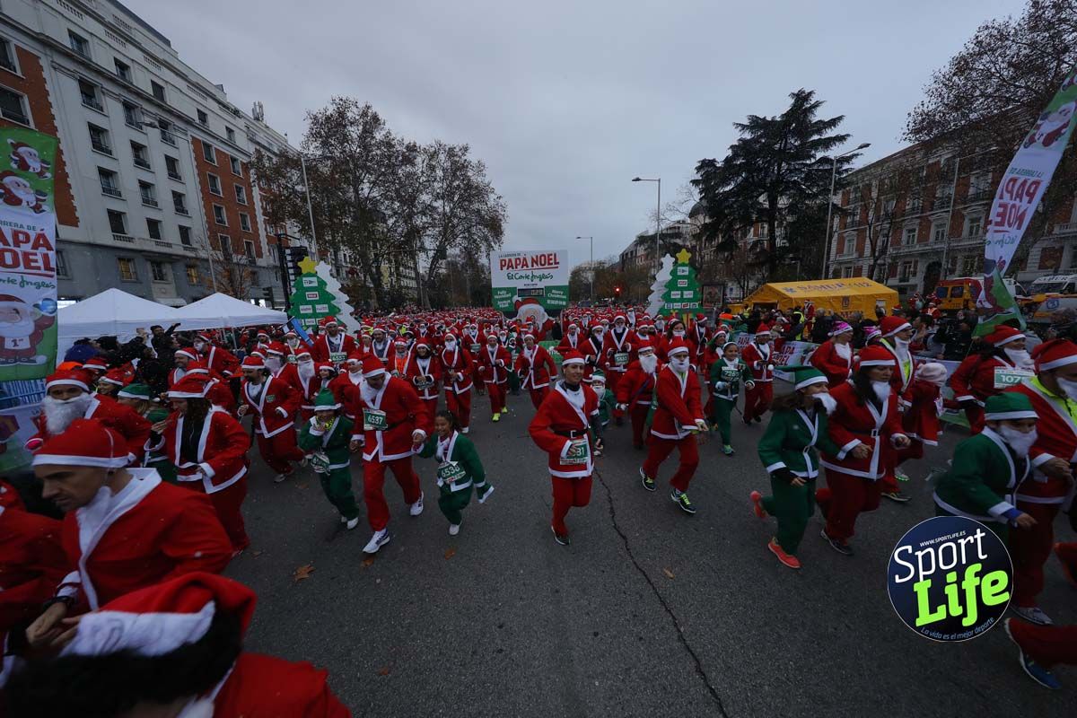 El ambiente de la Carrera de Papá Noel en Madrid