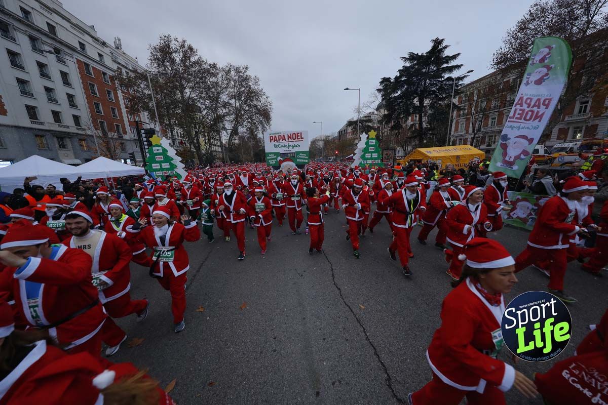 El ambiente de la Carrera de Papá Noel en Madrid