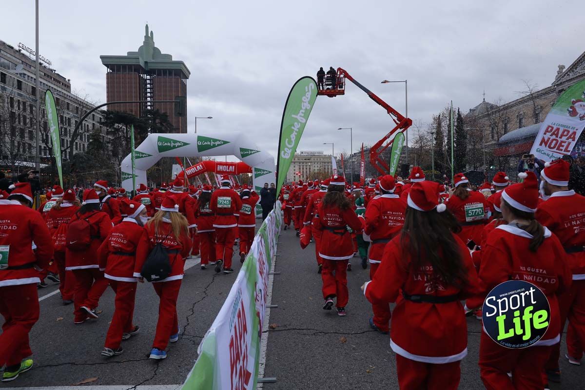 El ambiente de la Carrera de Papá Noel en Madrid