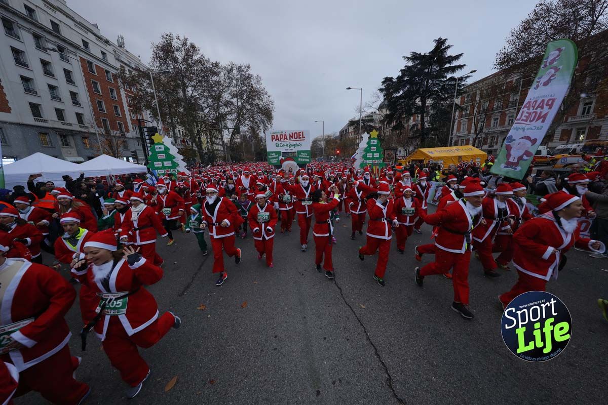 El ambiente de la Carrera de Papá Noel en Madrid