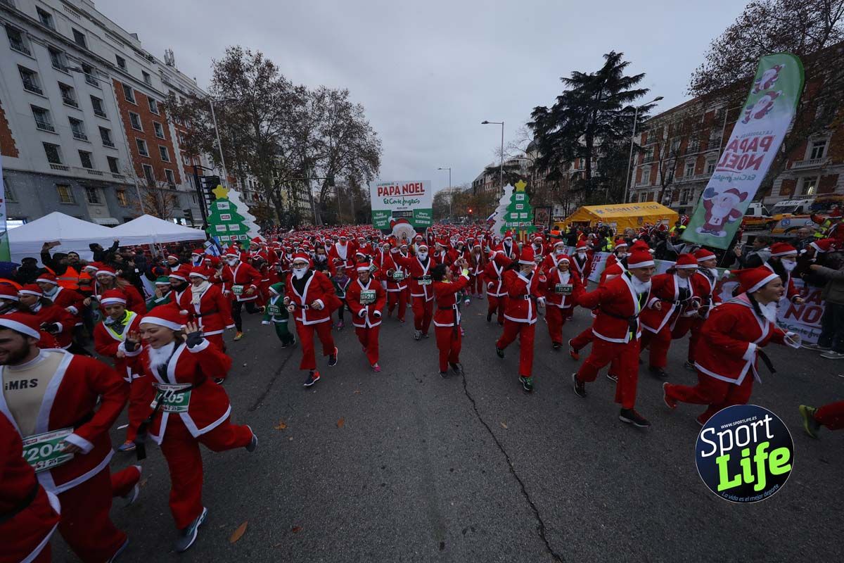 El ambiente de la Carrera de Papá Noel en Madrid
