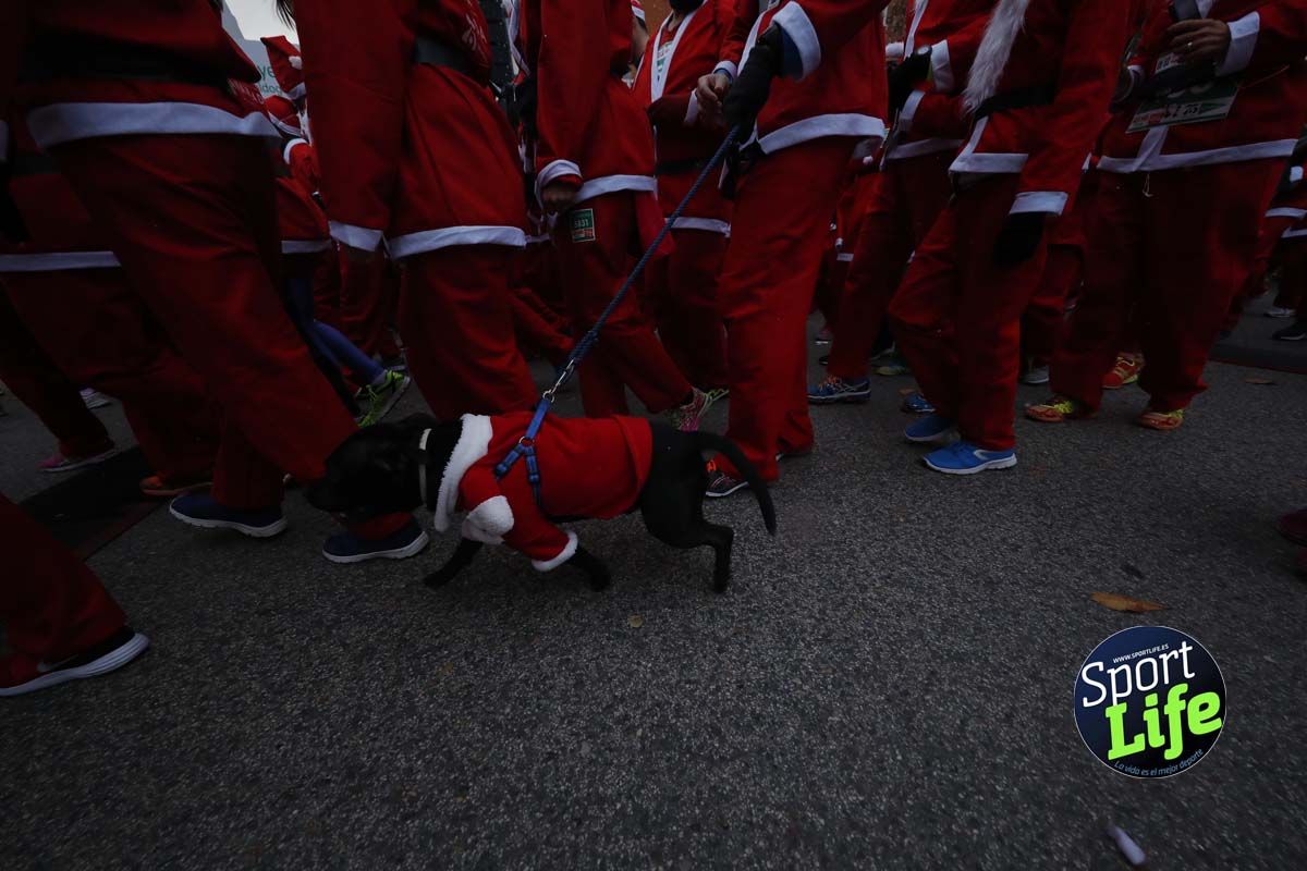 El ambiente de la Carrera de Papá Noel en Madrid