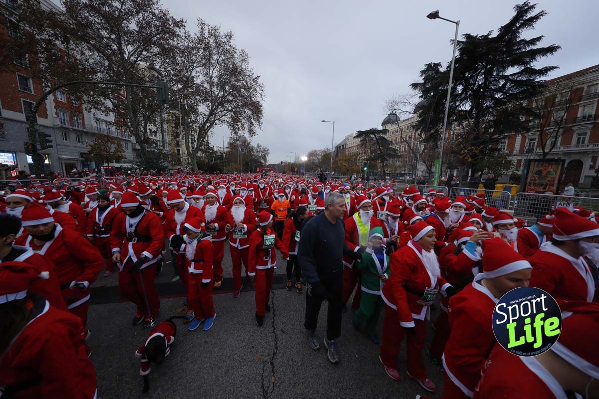 El ambiente de la Carrera de Papá Noel en Madrid