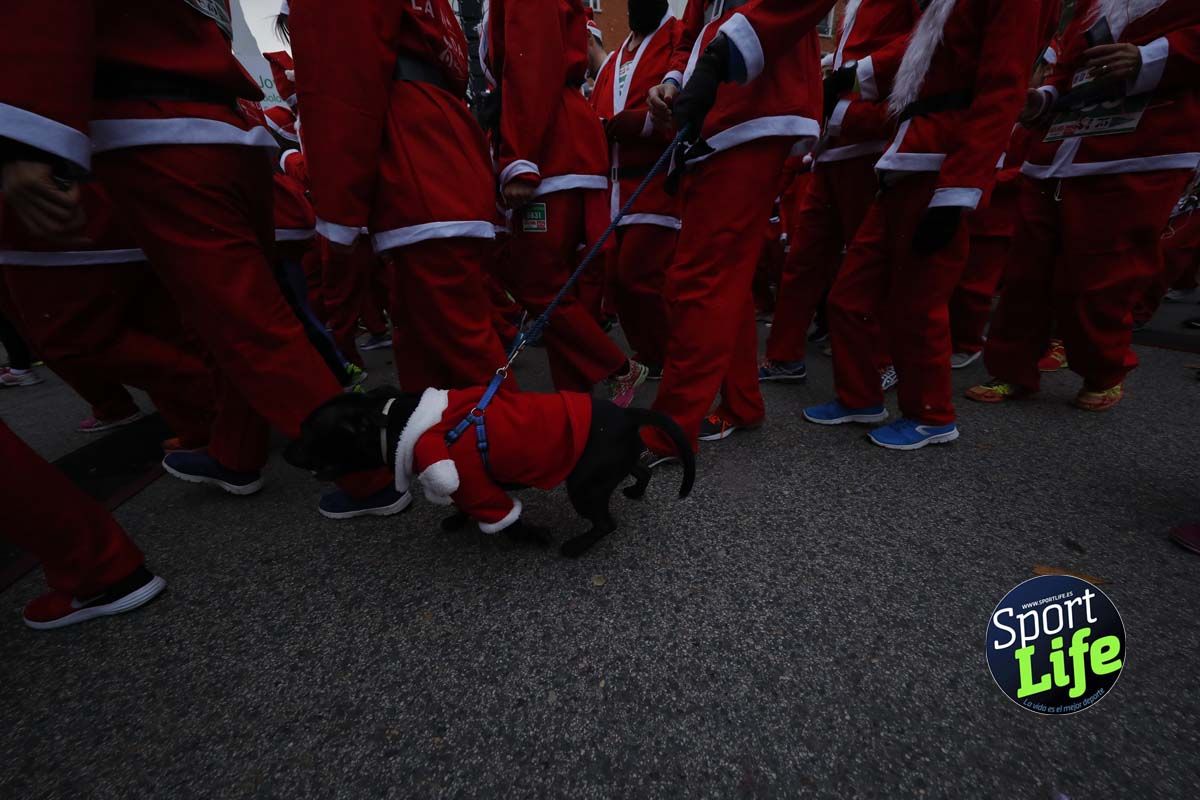 El ambiente de la Carrera de Papá Noel en Madrid