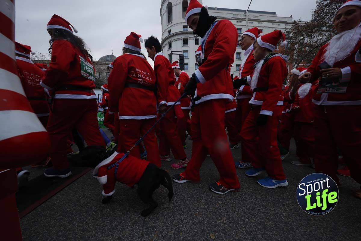El ambiente de la Carrera de Papá Noel en Madrid