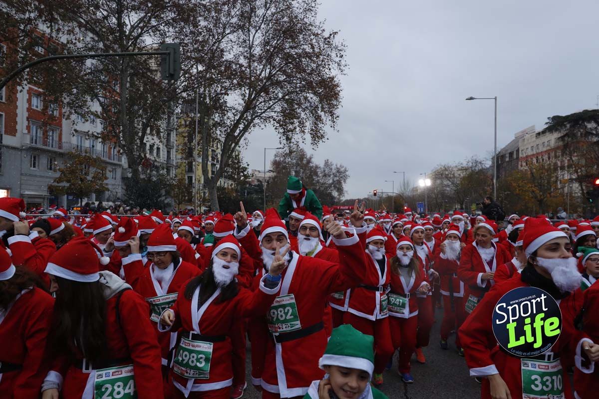 El ambiente de la Carrera de Papá Noel en Madrid