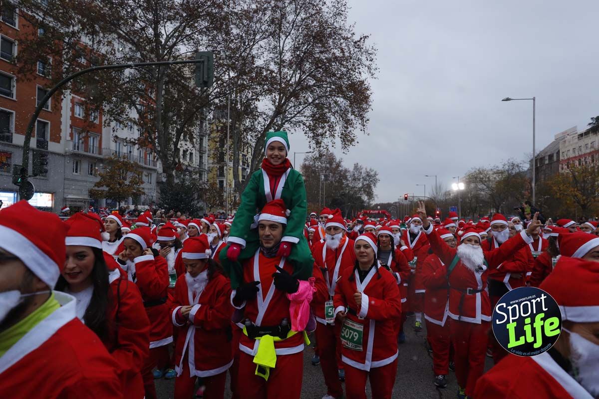 El ambiente de la Carrera de Papá Noel en Madrid