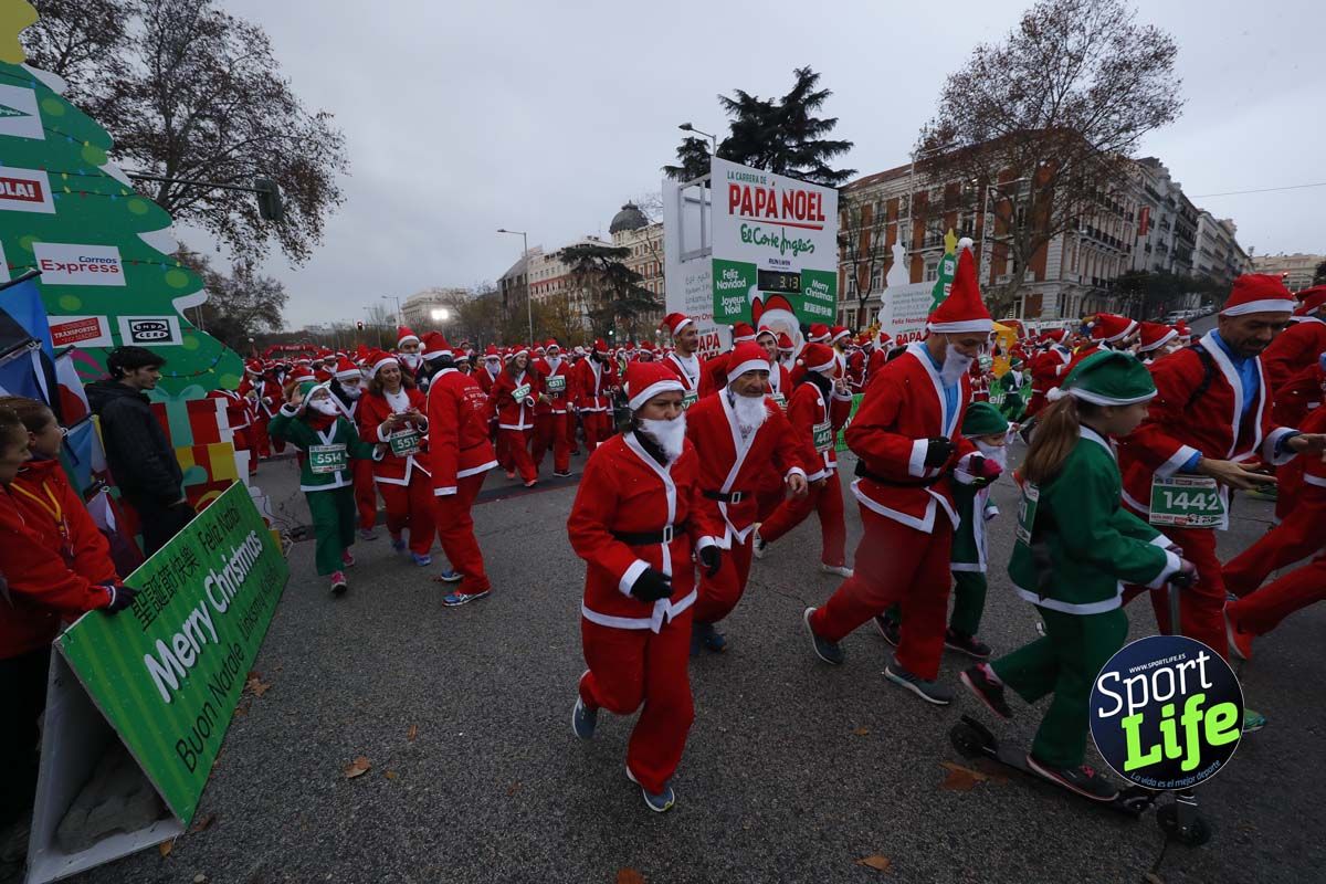El ambiente de la Carrera de Papá Noel en Madrid