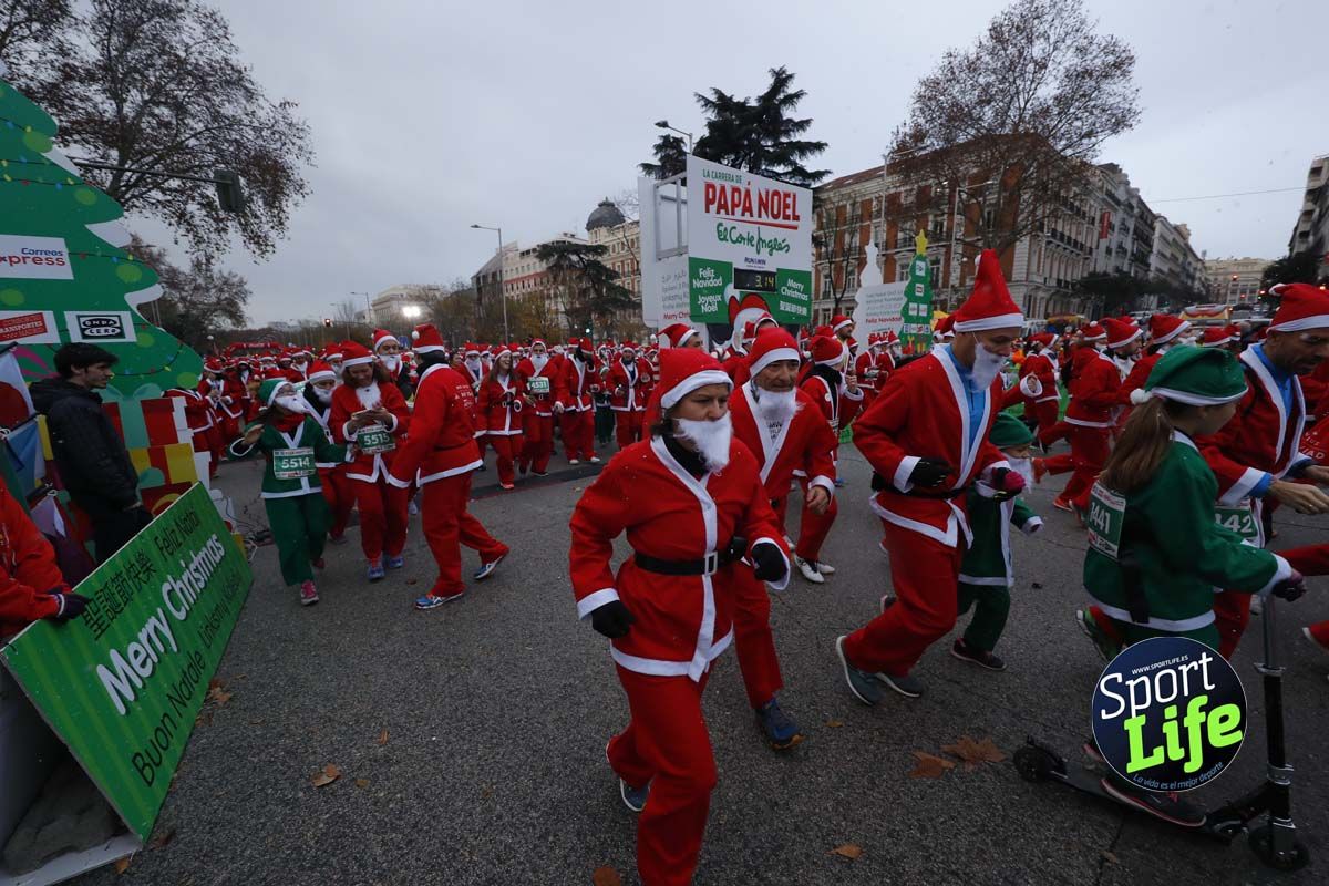 El ambiente de la Carrera de Papá Noel en Madrid