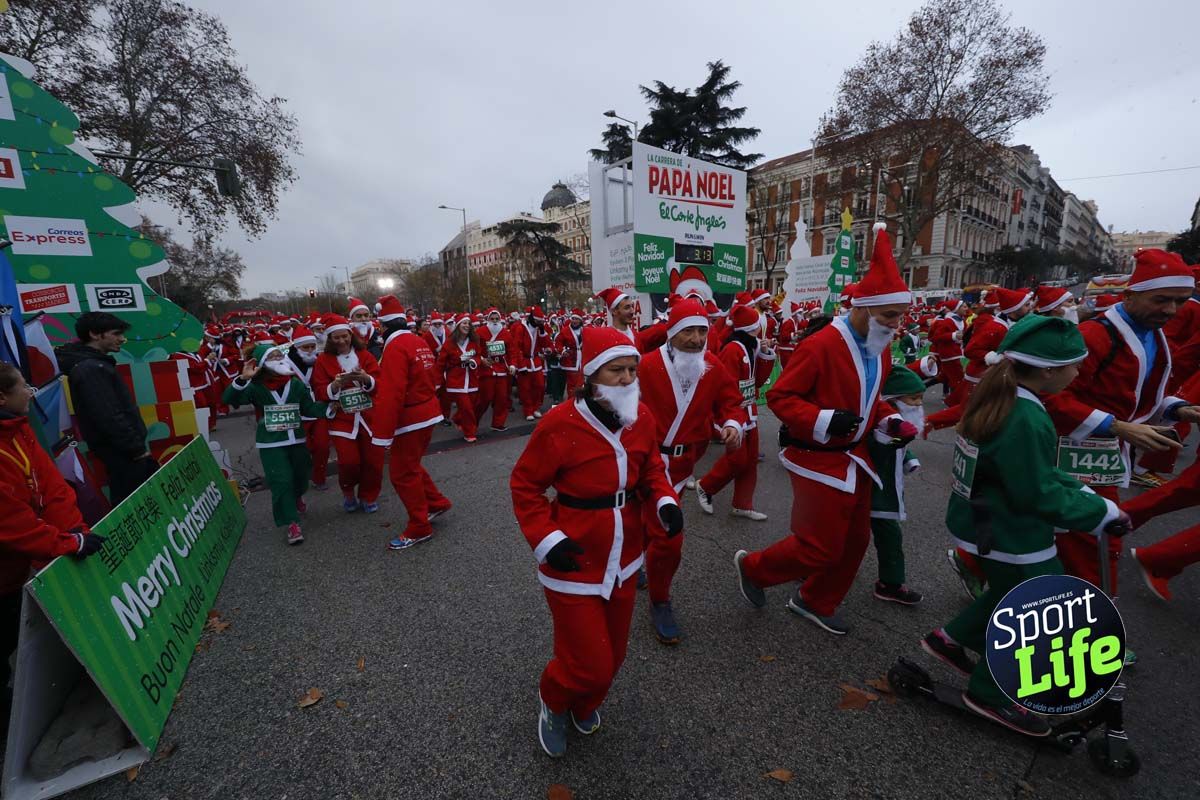 El ambiente de la Carrera de Papá Noel en Madrid