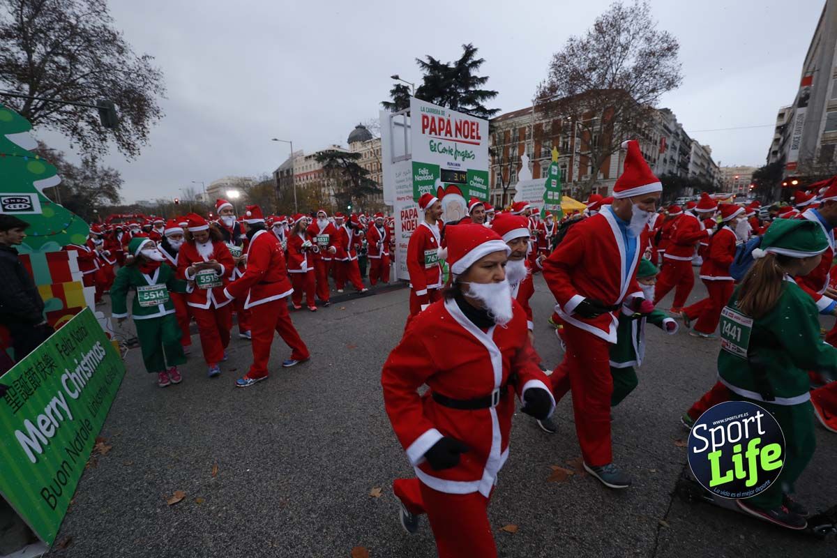 El ambiente de la Carrera de Papá Noel en Madrid