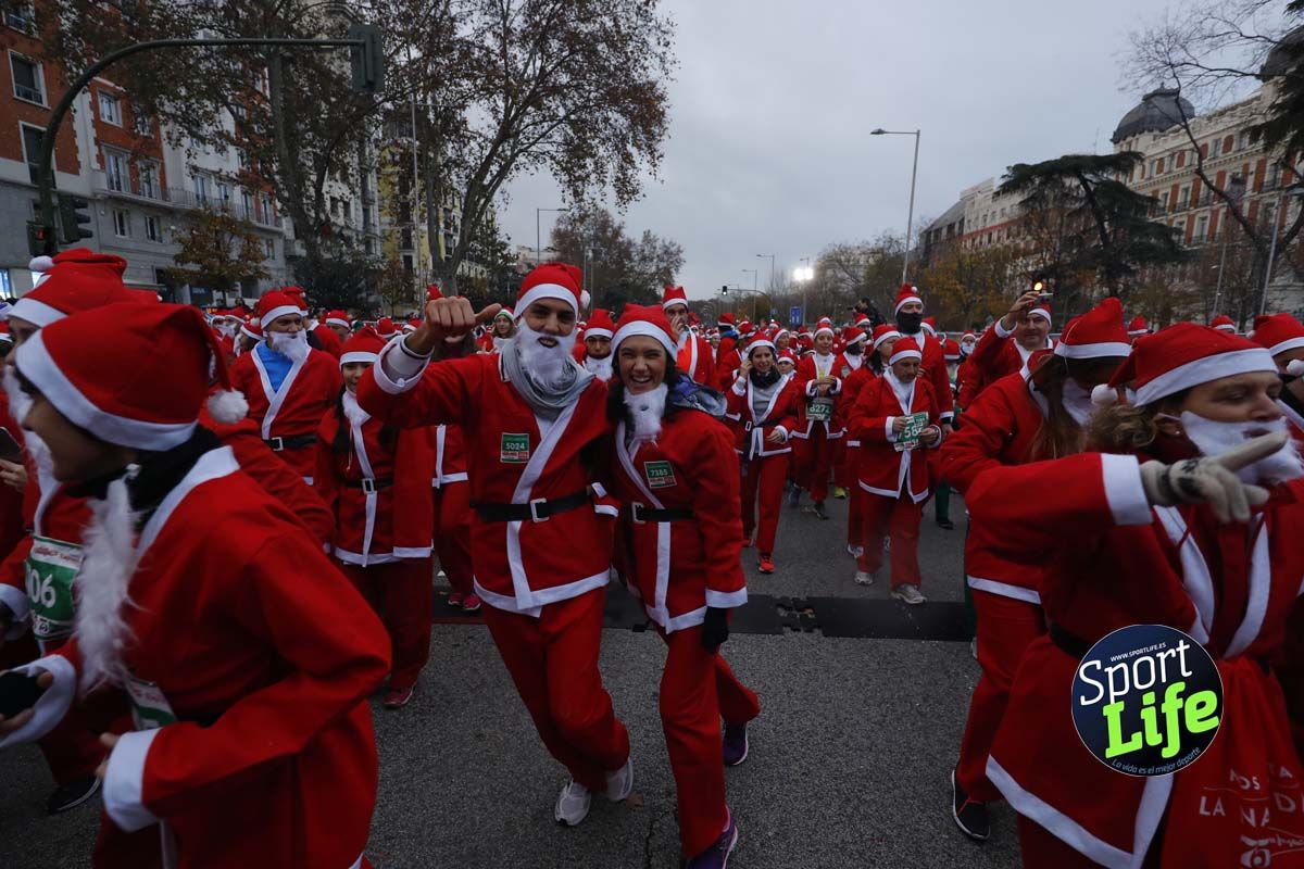 El ambiente de la Carrera de Papá Noel en Madrid