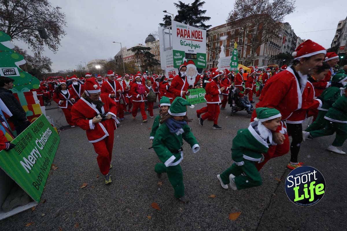 El ambiente de la Carrera de Papá Noel en Madrid
