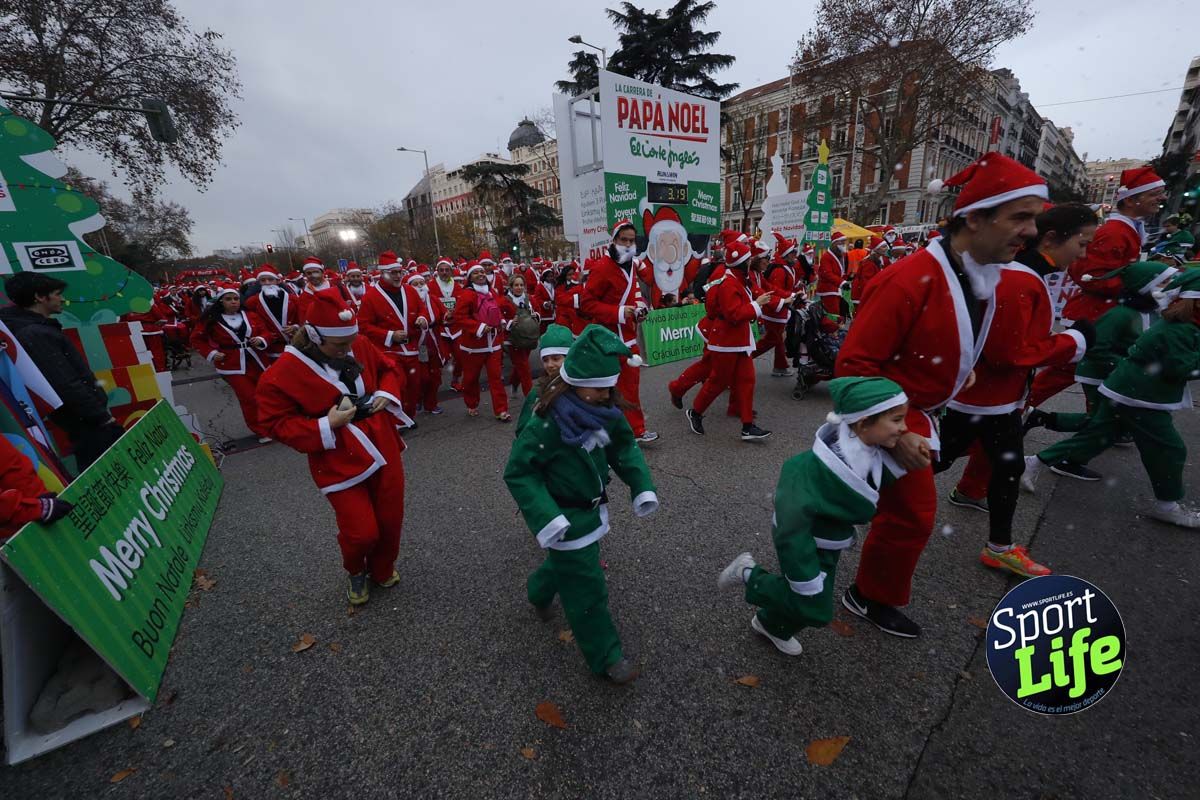 El ambiente de la Carrera de Papá Noel en Madrid