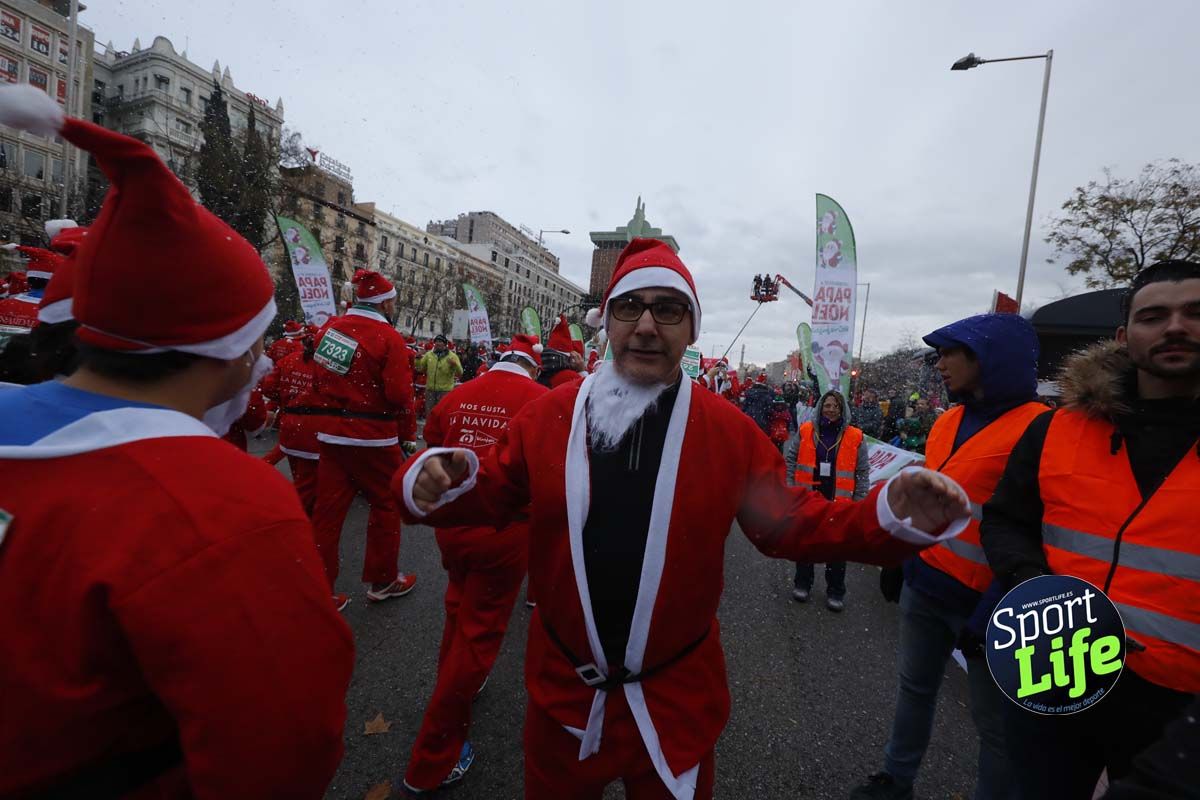 El ambiente de la Carrera de Papá Noel en Madrid
