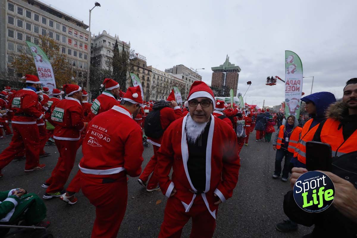 El ambiente de la Carrera de Papá Noel en Madrid