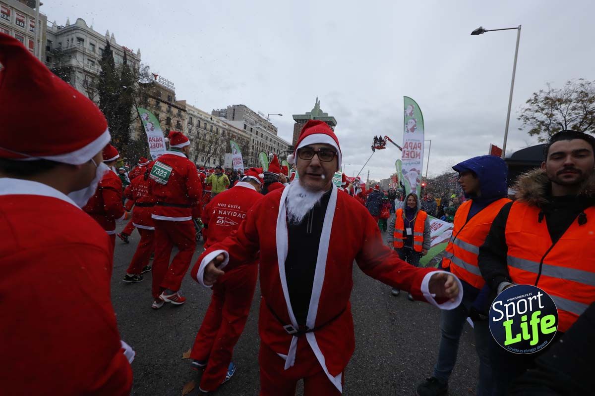 El ambiente de la Carrera de Papá Noel en Madrid