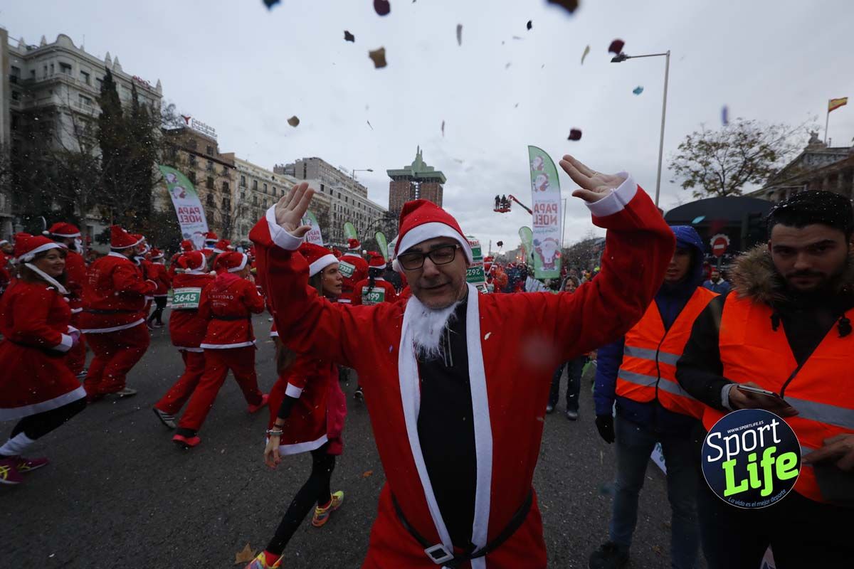 El ambiente de la Carrera de Papá Noel en Madrid