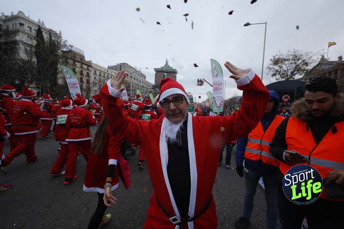 El ambiente de la Carrera de Papá Noel en Madrid