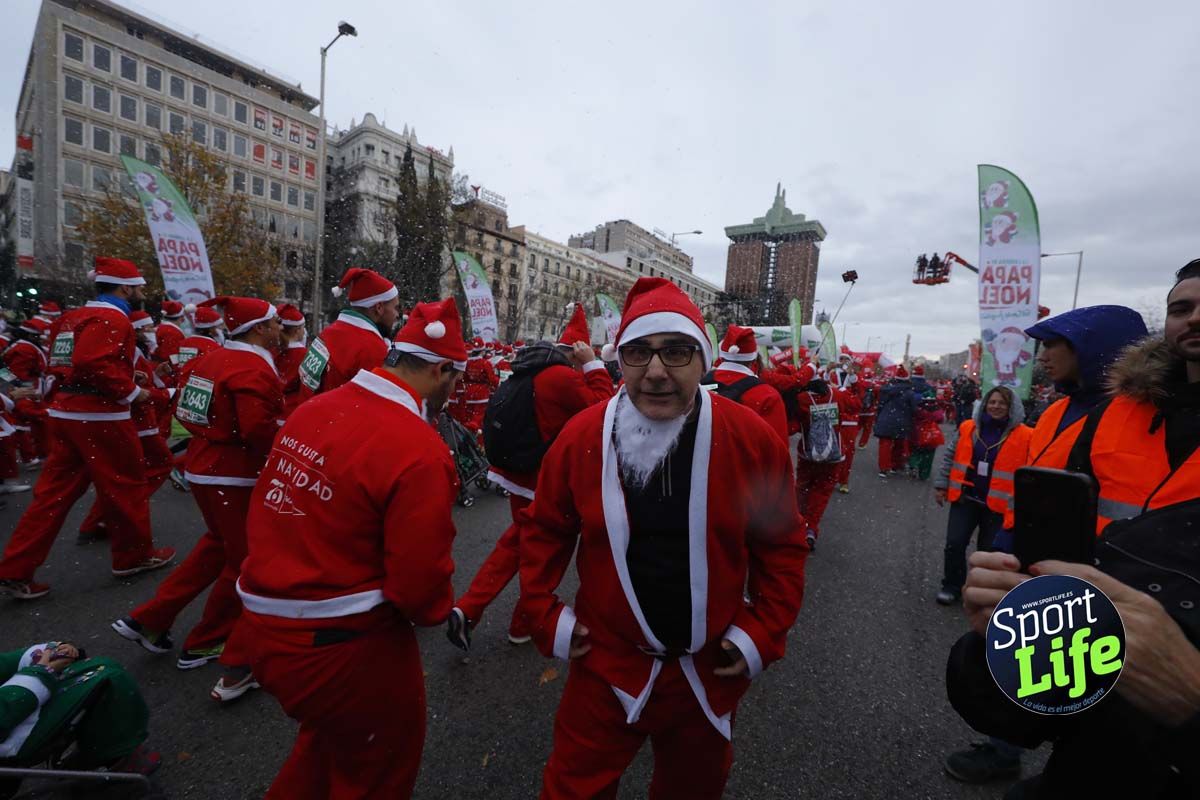 El ambiente de la Carrera de Papá Noel en Madrid