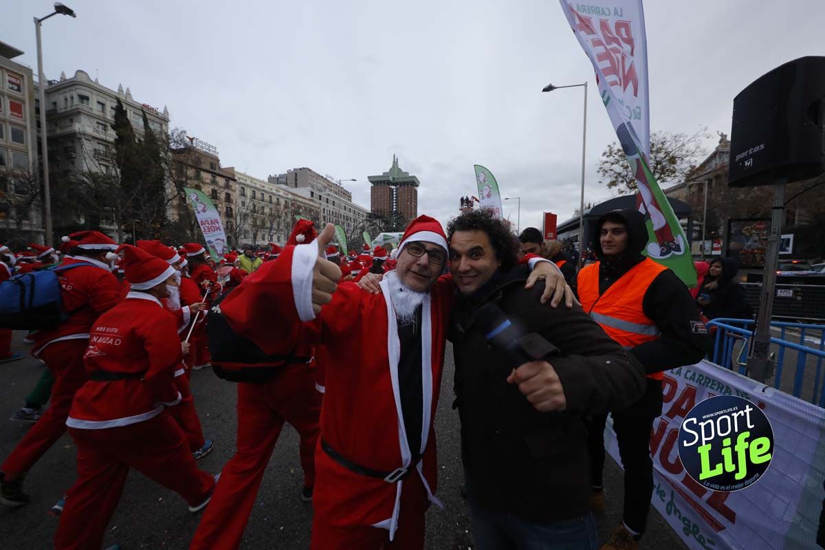 El ambiente de la Carrera de Papá Noel en Madrid