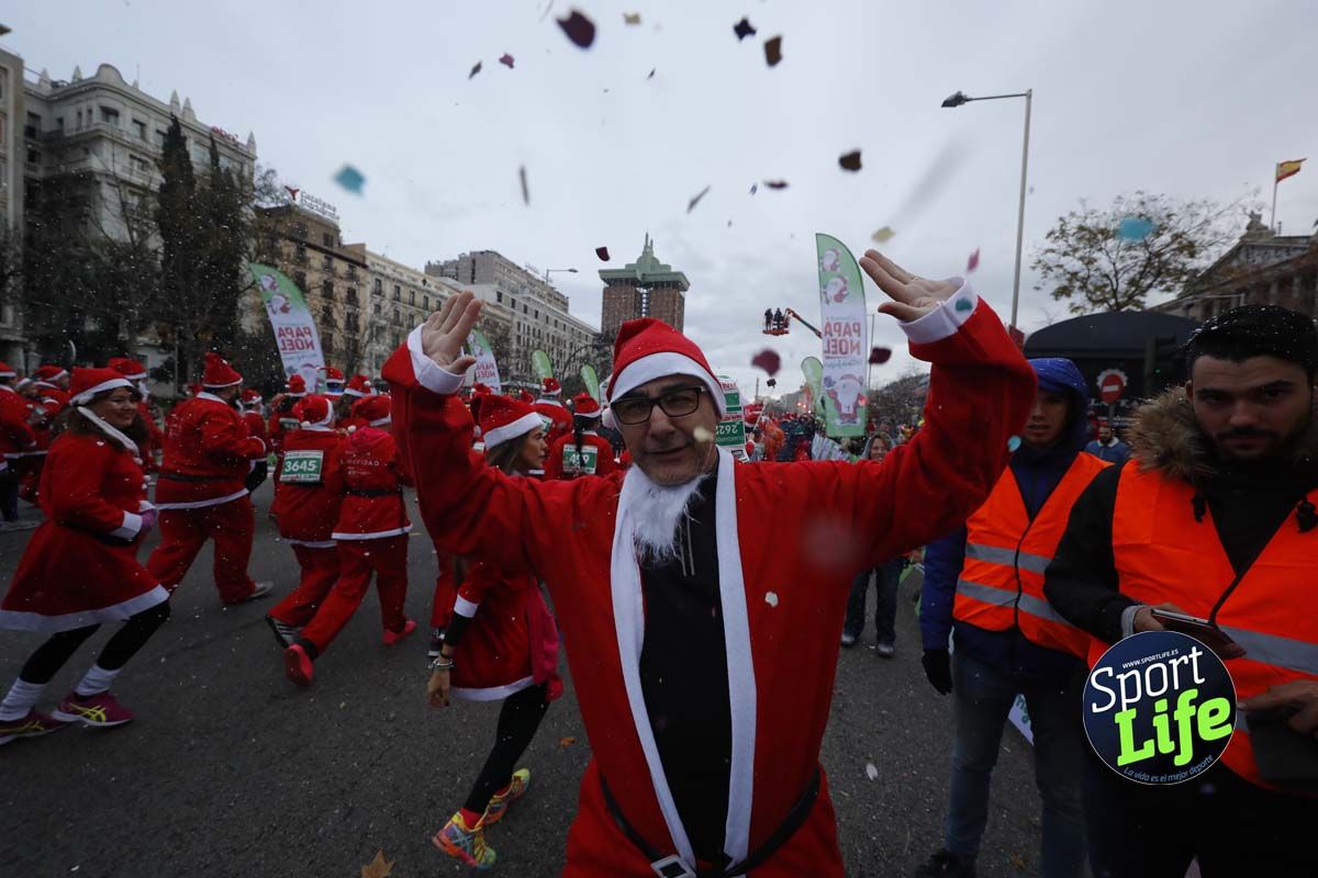 El ambiente de la Carrera de Papá Noel en Madrid